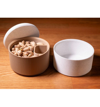 „Pistacijų Bokštas“ – užsukamas užkandžių indelis su lukštų skyriumi