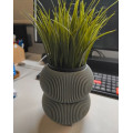 Decorative planter with legs for small plant