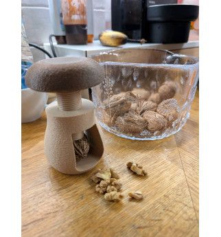 Grybuko formos riešutų gliaudyklė