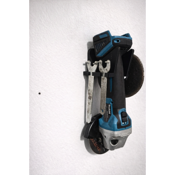 Angle grinder wall mount with disc and wrench holder