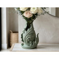 Decorative vase sculpture with acanthus leaves