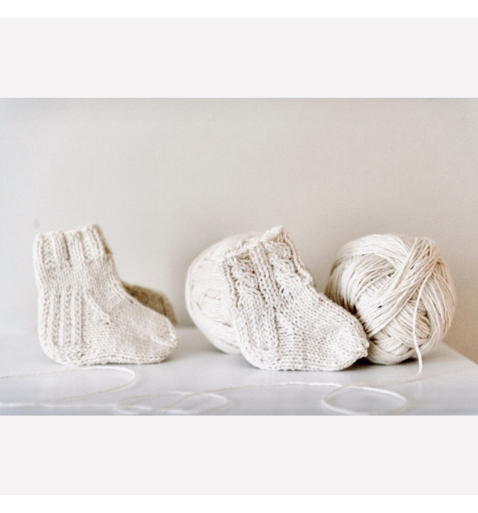 Vilaurita pirmosios vilnonės kojinytės